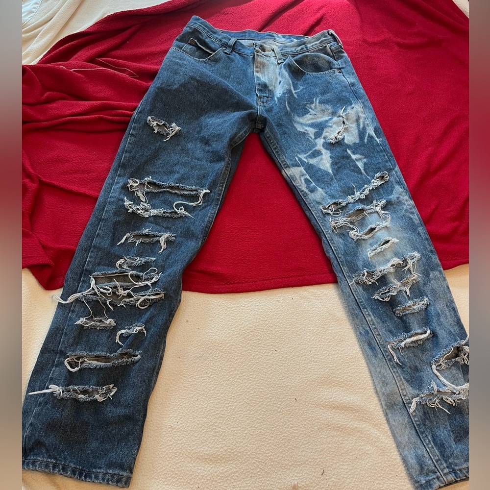 Blue and white acid washed ripped jeans